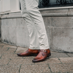Reinhard Frans Stockholm light cognac brown leather monk strap boots with silver buckle.